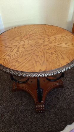 Round table for sales from American Furniture Ashley furnitures