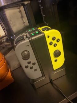 Charging doc and 2 pairs of controllers ALL for $30