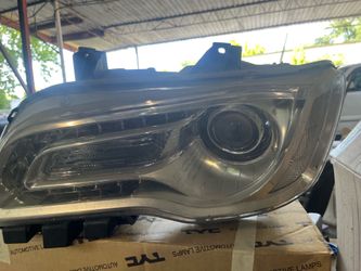 2016 Dodge 300 used left headlight