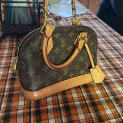 Louis Vuitton Alma BB handbag  (will negotiate price)