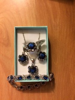 Jewelry Silver Brasalet...Chain..finger ring and ear ring.