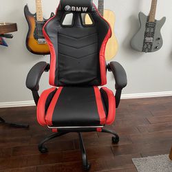 gaming chair with 5 rolling wheels, height adjustable..... Price is firm $105  cash... No less, no trades.. pick up in east Plano 