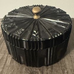 Vintage Indiana Glass Tiara black covered candy dish with a gold-tone finial.