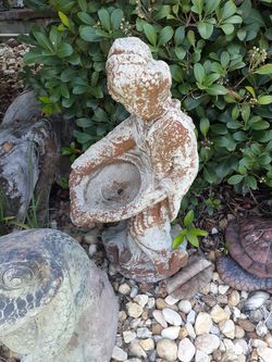 Cool concrete geisha girl can be made into a fountain piece