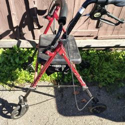 Walker With Seat And Storage Compartment 