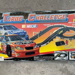 NASCAR  Turbo Challenge battery operated slot car racing with 12 feet of track - batteries not included.  $34.99 Through Sunday, April 19.