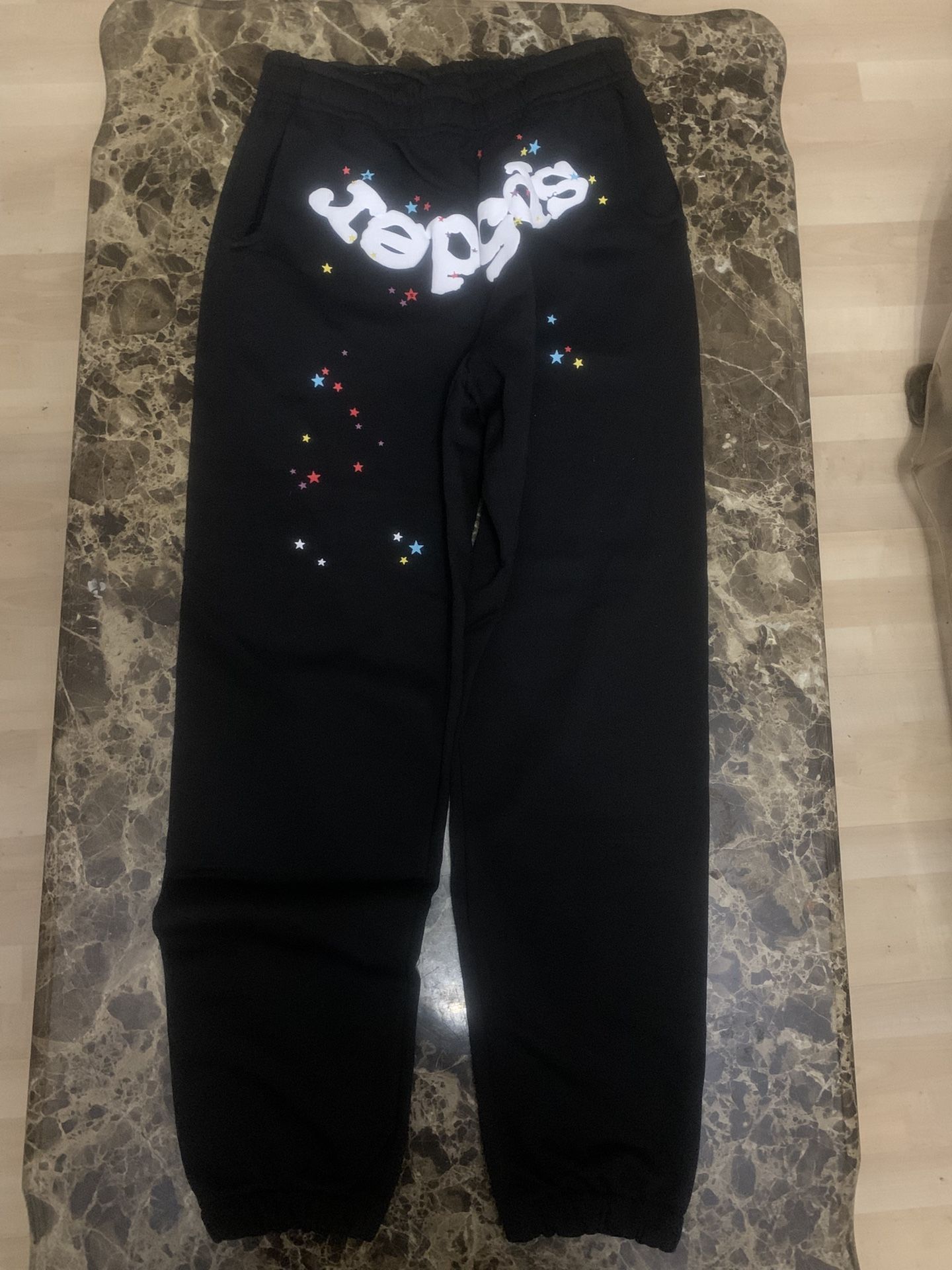 black spider sweat pants