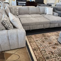 4 Piece Sectional With Pull Out Bed & Storage Chaise On Sale