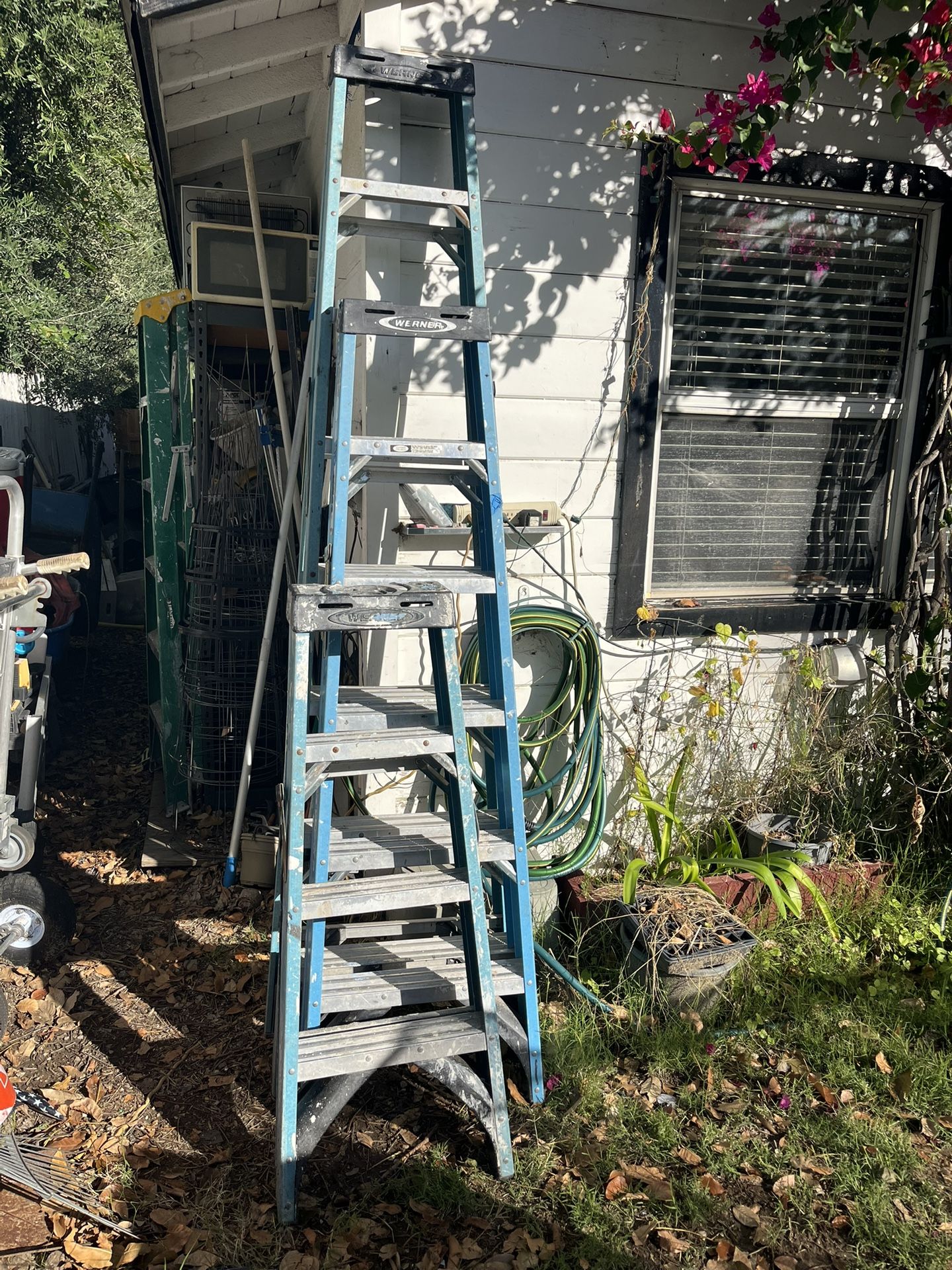 Set of 8 foot 6’ and 4 foot ladders