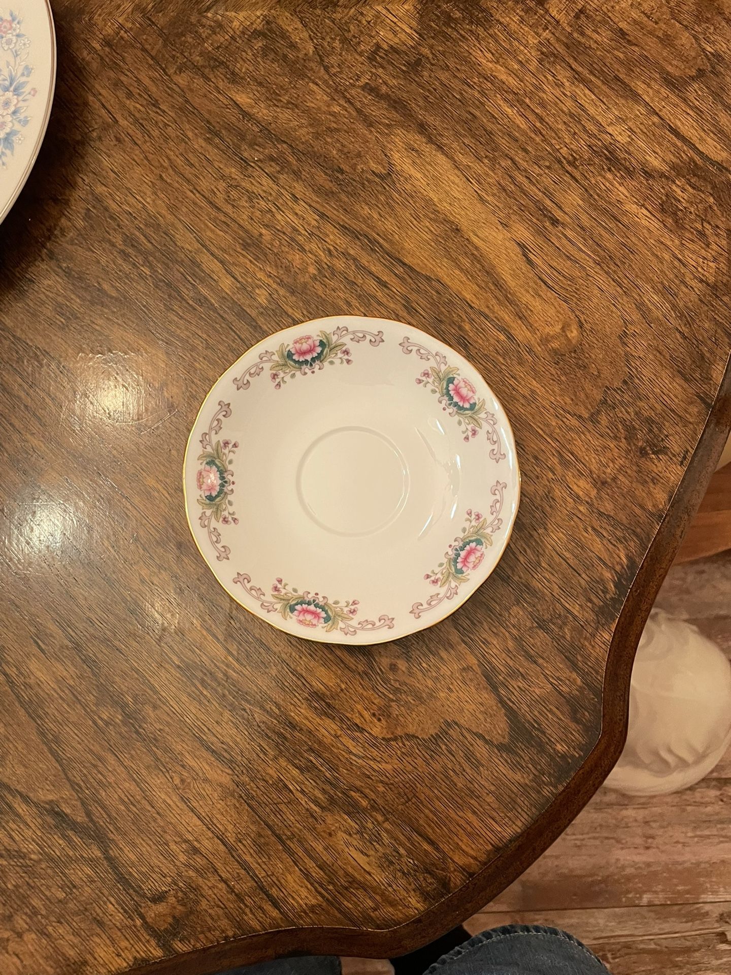 Three Porcelain Teacup Plates