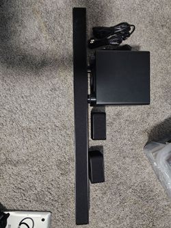 Black Soundbar with Subwoofer and Rear Speakers