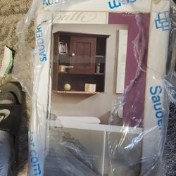 Cabinet above toilet NEW not opened