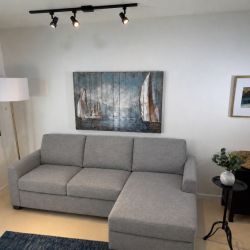 Coddle Luke Fabric Sleeper Sofa with Reversible Chaise and Storage