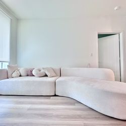 126" Beige Luxury Aesthetic Sofa With Pillows And Plush