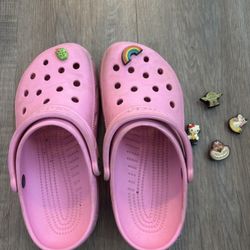 pink crocs w/ charms 