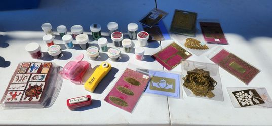 Embossing powder, brass embossing stencils, and decorative paper punches
