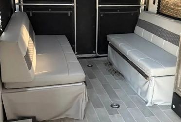 RV Toyhauler fold down rear beds.