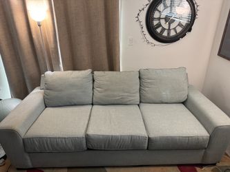 Living Spaces Couch 101 inches wide grey/blue
