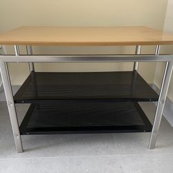 3 Tier Table For a Television or Music Equipment Placement Top Is OakWood And the Rest 2 Metal Shelves 