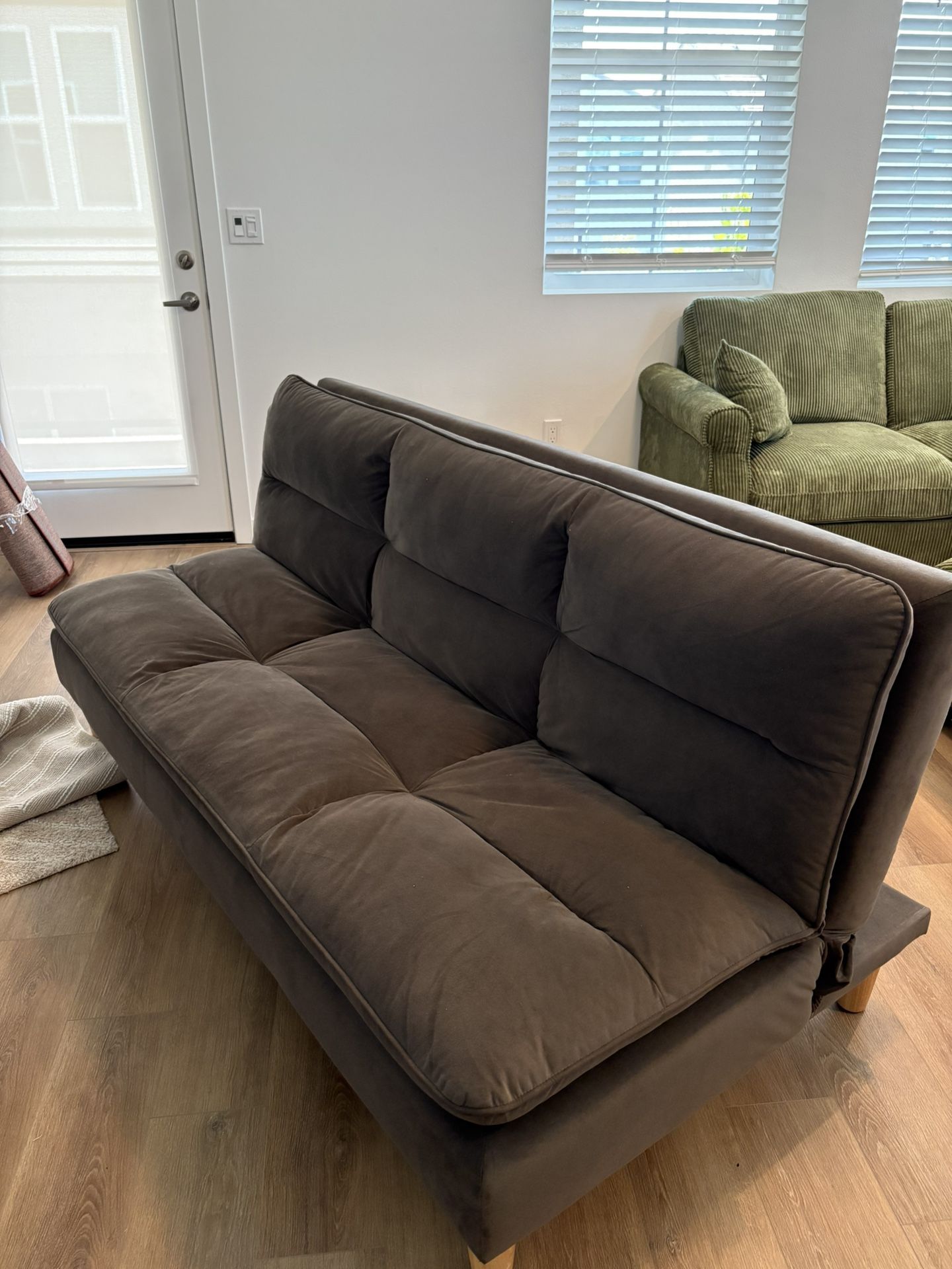 Brown Futon. Opens Up As Bed.