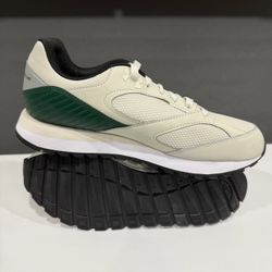Under Armour Men’s Cream & Green Athletic Runner Sneakers. Under Armour men’s low-top sneakers in cream with green accents. Lightweight design with br