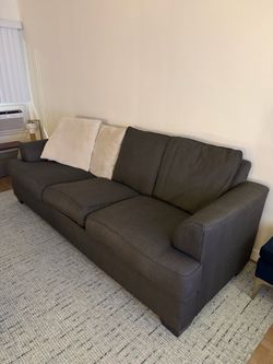 Large couch for sale. 8 feet wide. Comfortable