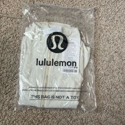 WHITE LULULEMON JACKET (READ DESCRIPTION)
