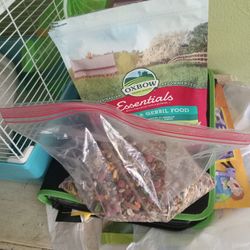 Used Hamster Cage And Bedding And Food All For 20 Dollars