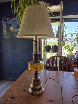 Vintage lamp with amber glass middle