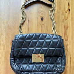 Michael Kors. Quilted Leather Shoulder Bag with Chain Strap and Gold Clasp.