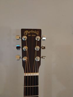 Acoustic guitar martin  LX1E barely used