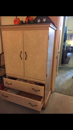 Dresser and tv stand in one very well keep up