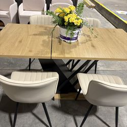 【Set Of 5】With a 61.81 (46.46) inch Extendable Tabletop, This Modern Geometric Dining Table Comes with a Metal Frame,With 4 Chairs  $399  Warehouse Ad