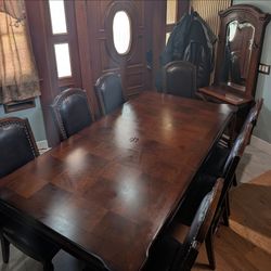 Large rectangular wood table and 8 dining chairs