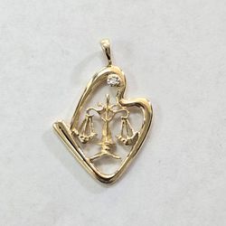 14kt Gold And Diamond Scale Charm