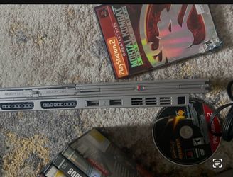 PlayStation 2 Slim Console with Games
