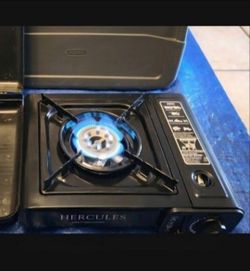 Hercules brand Butane Outdoor Cook Stovetop Camp Stove in a Case, 4 New Sterno Brand Cartridges. Also comes with 21 piece Ozark Trail 4 Person Table S