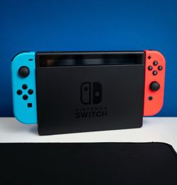 Nintendo Switch with Neon Joy-Cons and Dock