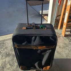 Suitcases by Samantha Brown and Compass