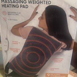 Sharper image calming heat massaging weighted  heating pad
