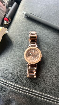 Michael Kors women’s watch ($60)
