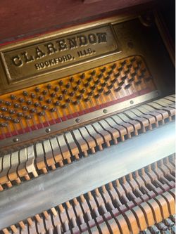 Piano 1900s upright made by Clarendon in Rockford