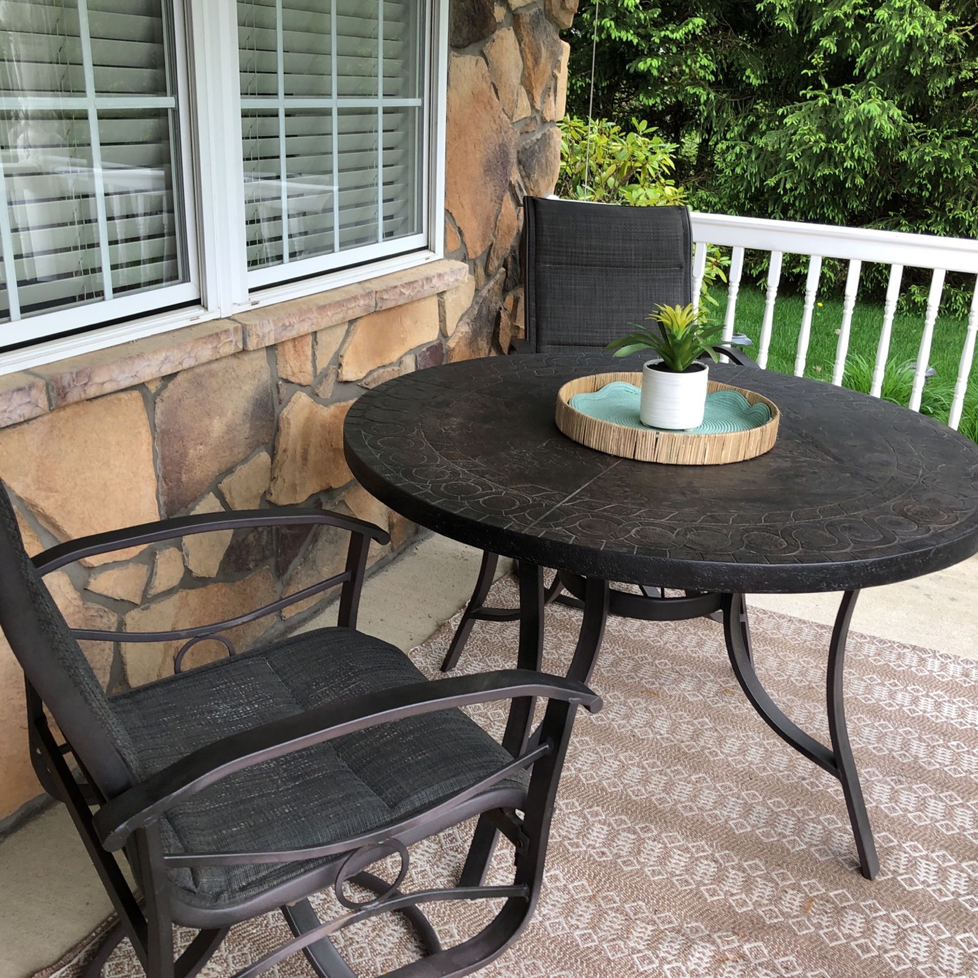 Outdoor Table And Four Swivel Chairs