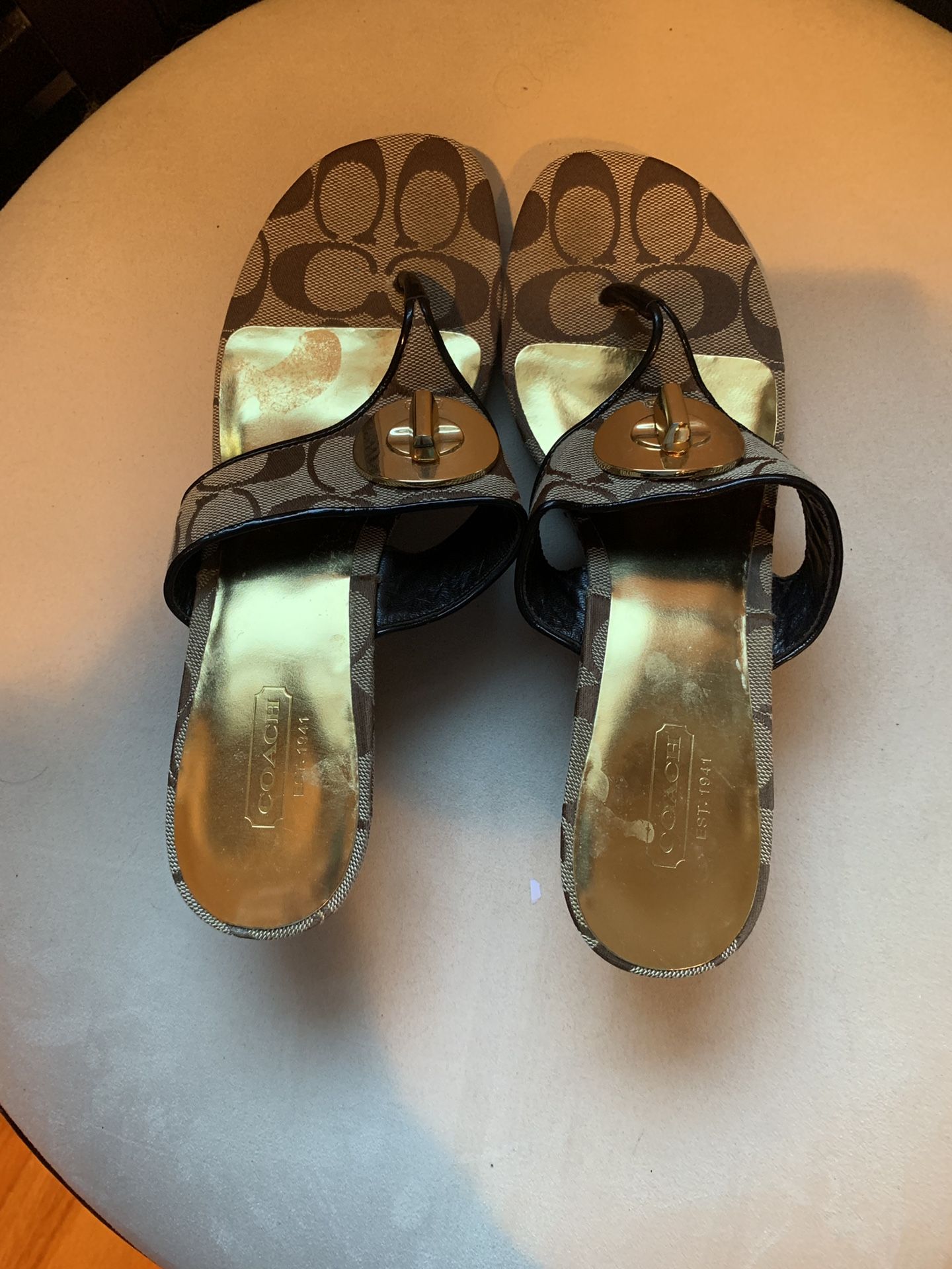 Brand new Woman’s Coach Shoes Brown 100% authentic size 7/8