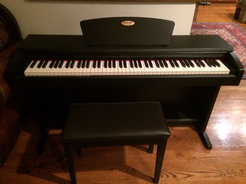 Suzuki digital piano and piano chair