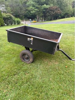 Tow behind dump wagon