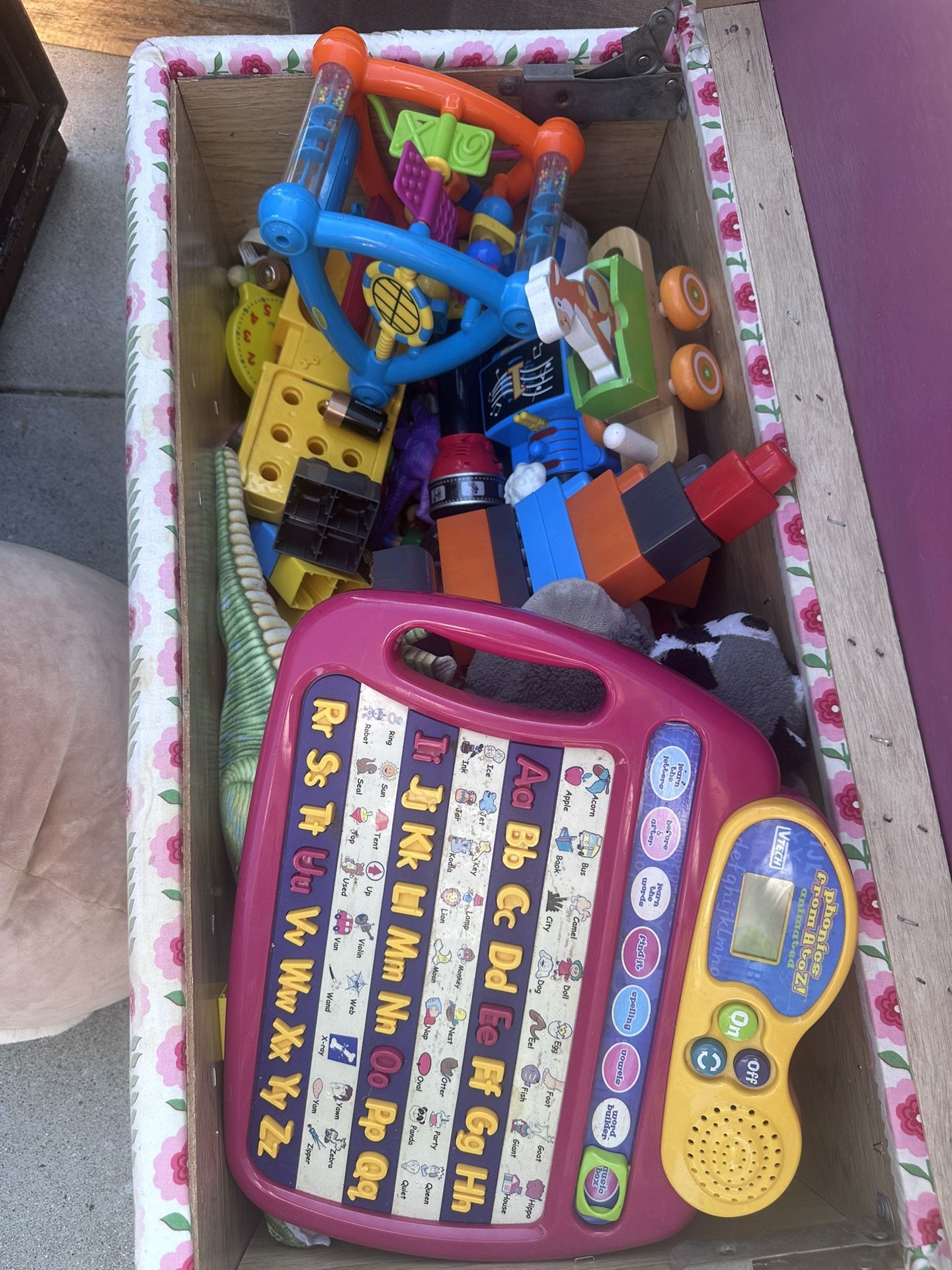 Toy Box Filled With Miscellaneous Toys