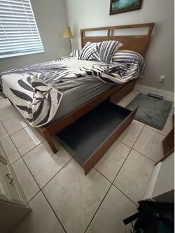 Queen Size bed frame and backboard.