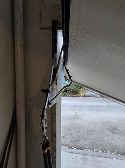 Overhead Garage Door Spring Opener Off Track Adjustment Replace And Parts 