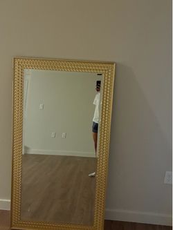 Gold framed mirror